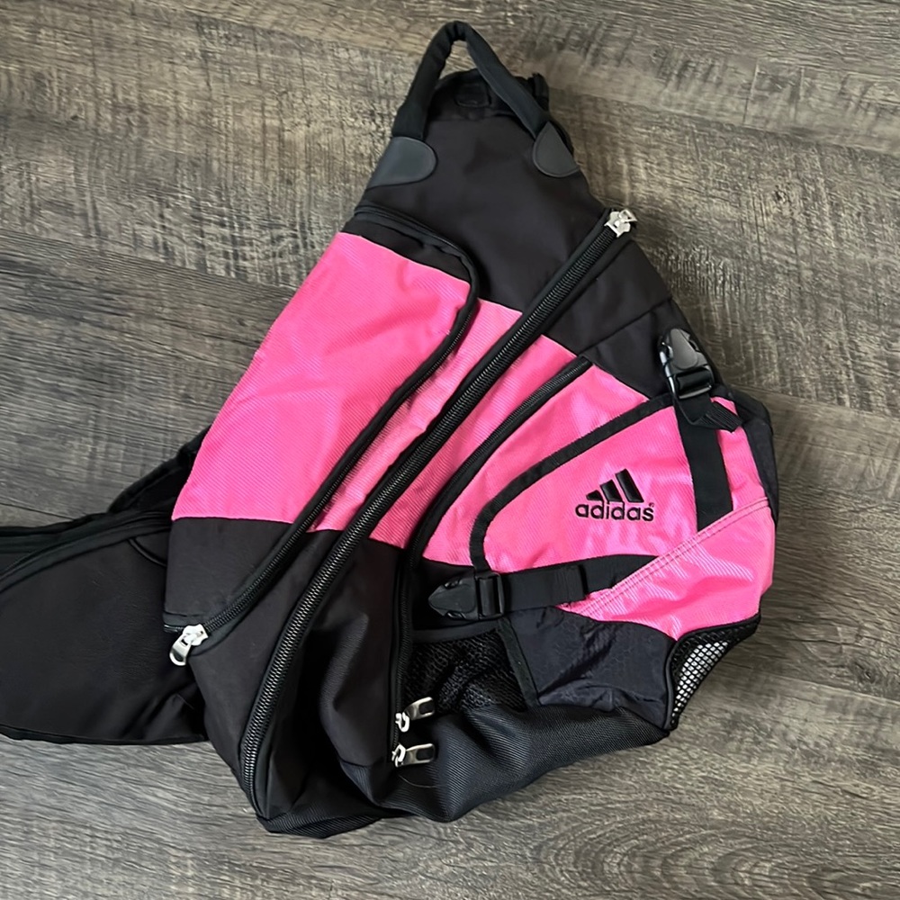 Adidas one shoulder backpack. Black and pink